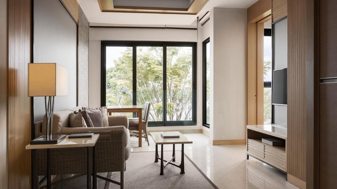 Amari Phuket Hotel Patong Luaran gambar A living room in a suite at the hotel